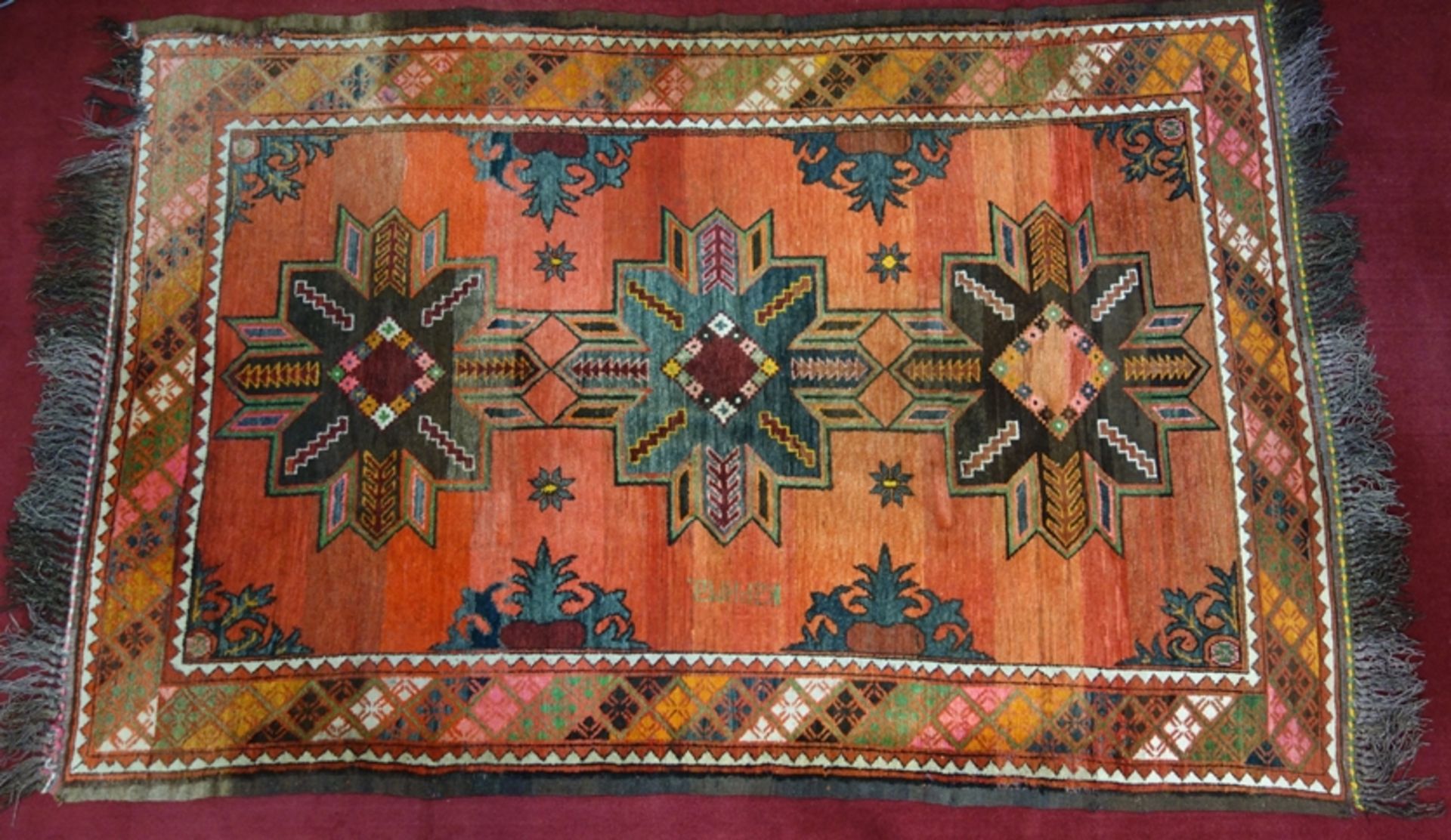 Teppich, Turkmenistan, 170*260cm, rostrot-gründig, stärkere Gebrauchsspuren, zu