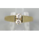 Ring mit 2 Brillanten, total ca.0,22ct, 585er Gelbgold, Gew.3,39g, 2 Brillanten