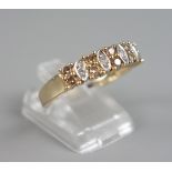 Ring mit Diamanten, klar und Fancy Brown , 375er Gold, Gew.3,07g, 10 Diamanten