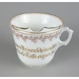 Barttasse, um 1900schauseitig mit Spruch, Goldkonturen, H.8cm