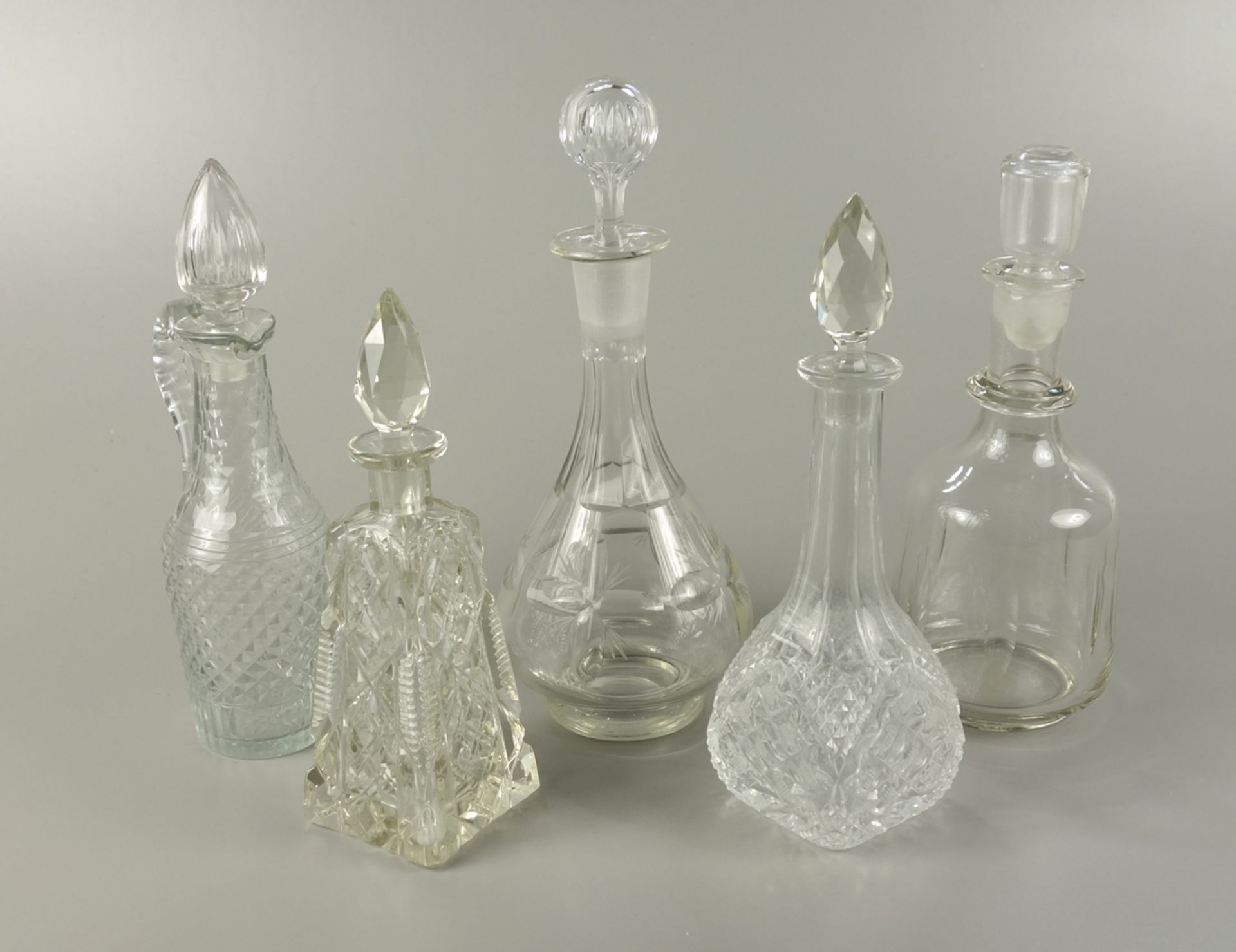 5 small carafes, glass and crystal, 20th c.