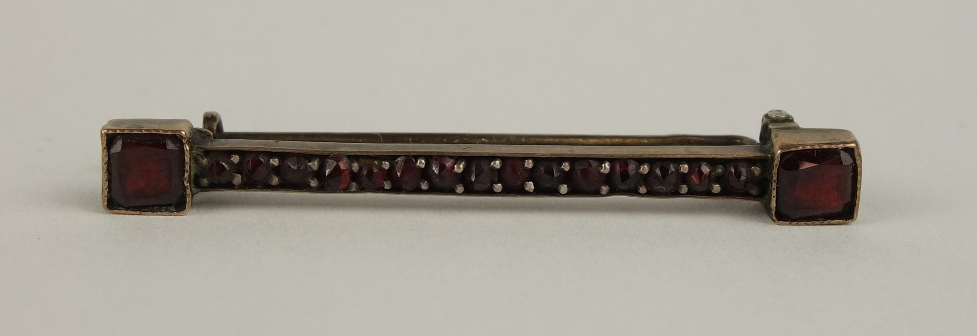 small garnet pin, Bohemia c. 1890