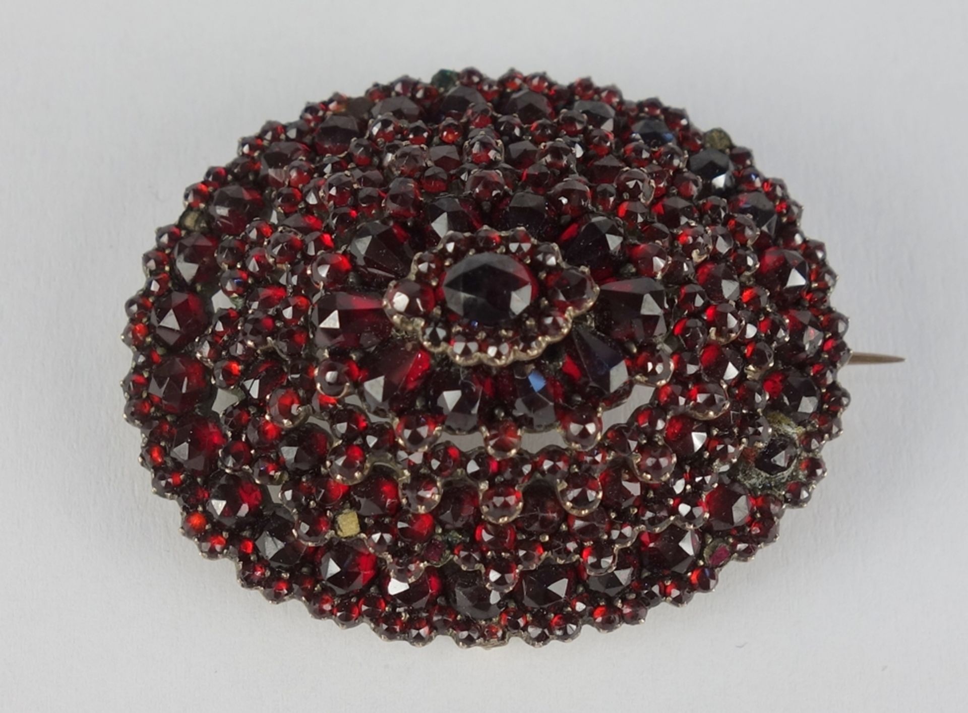 oval garnet brooch / pendant, tombac, Bohemia c. 1890