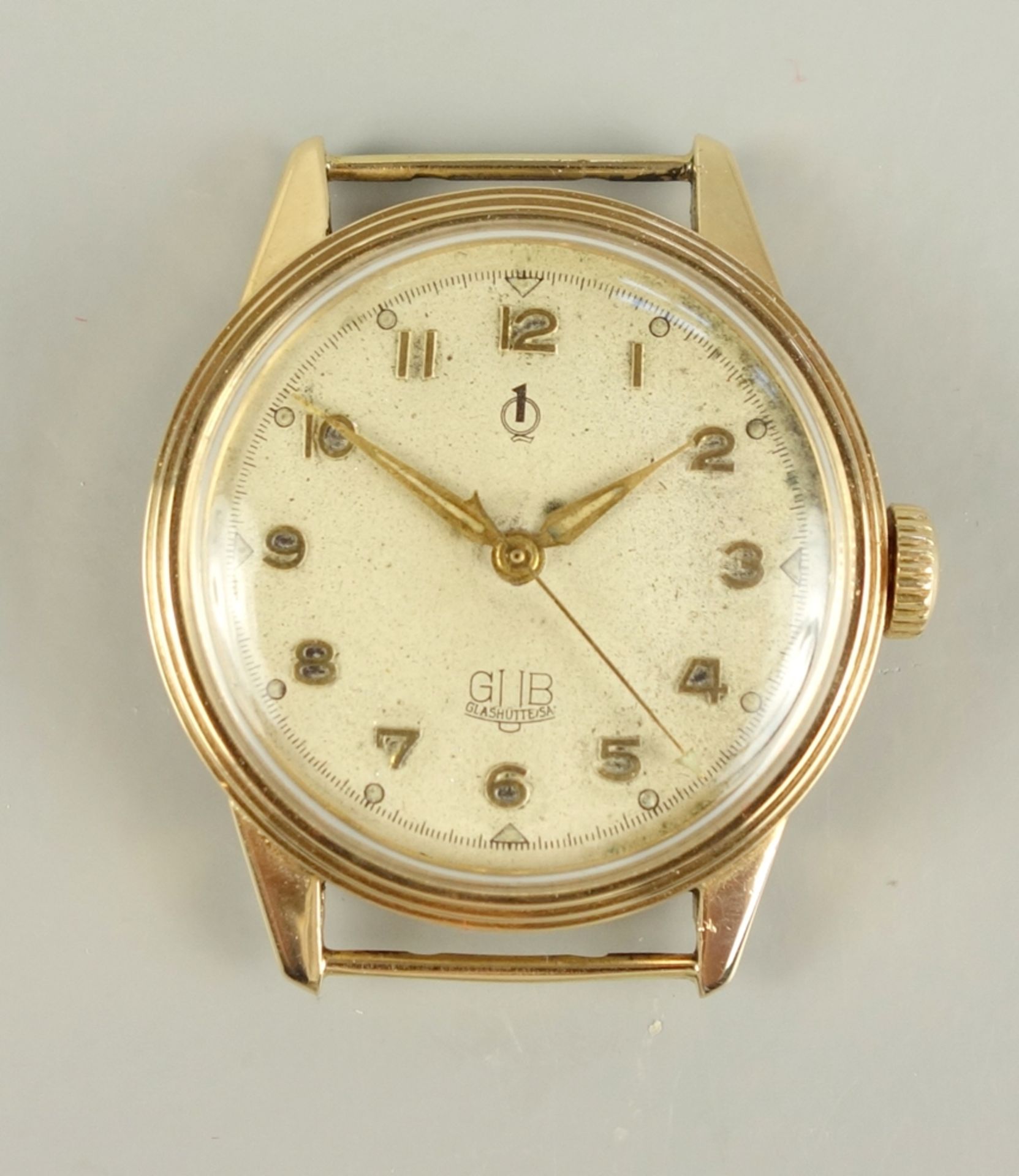 Goldene Armbanduhr, VEB Glashütter Uhrenbetriebe Güteuhr Kal. 28.1, um 1955