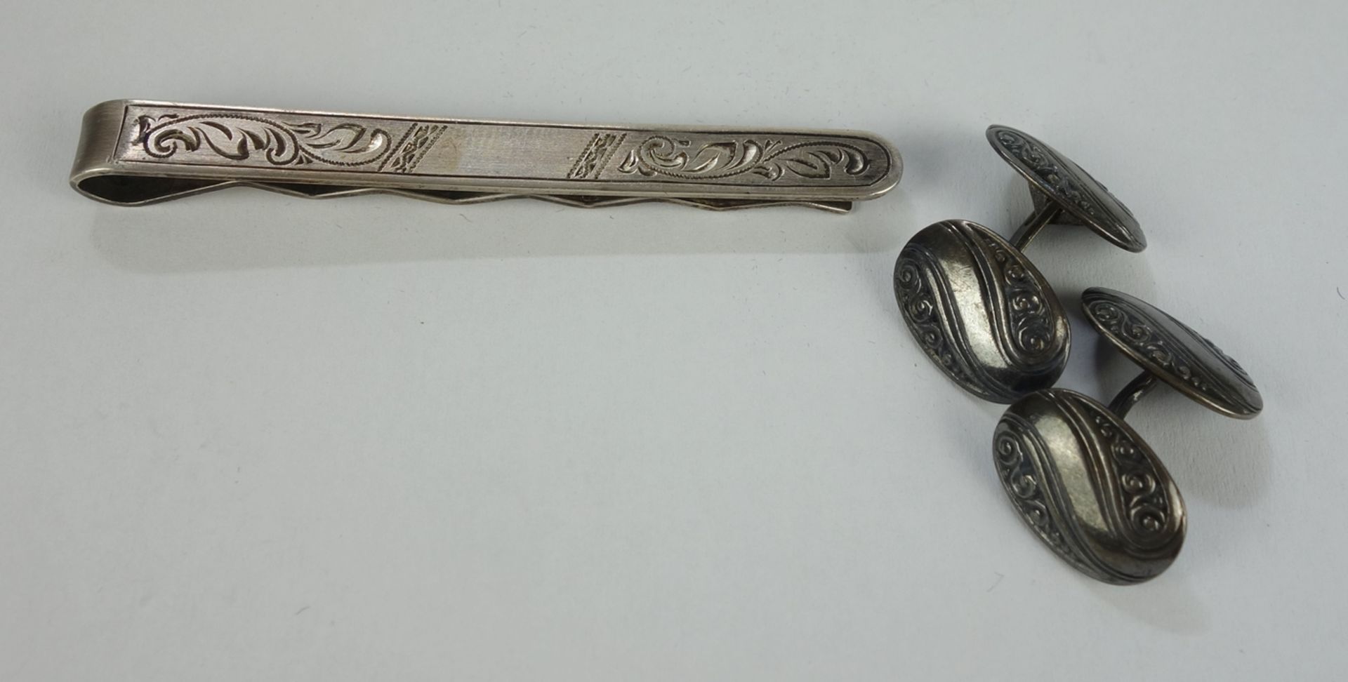 Tie pin, 800 and pair of cufflinks, 835 silver, w.18,86g