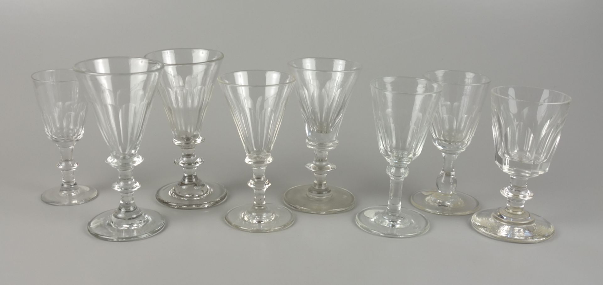 8 different liqueur glasses with faceted dome, c.1890