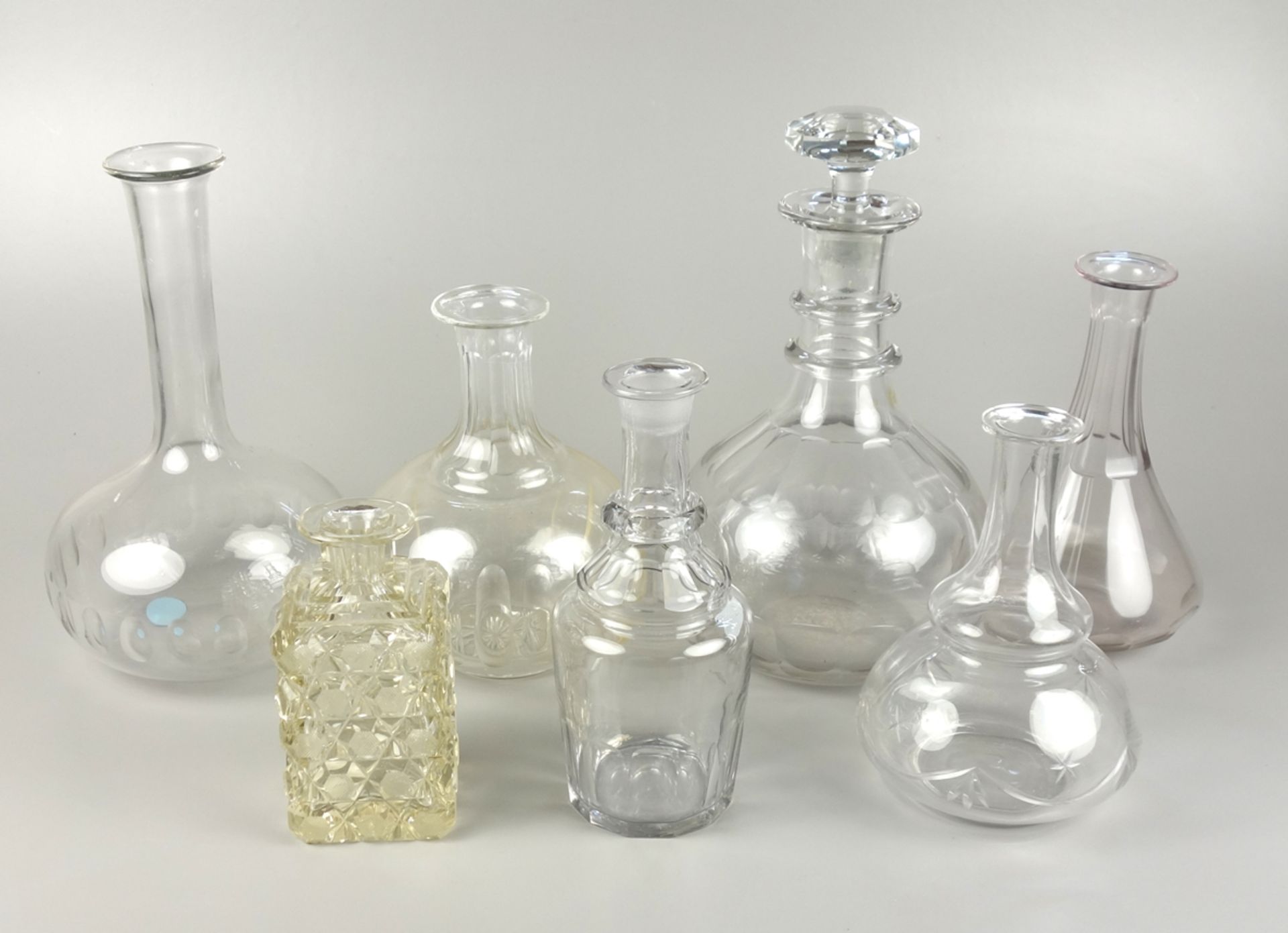 7 different carafes with cut decoration, end of 19th cent.