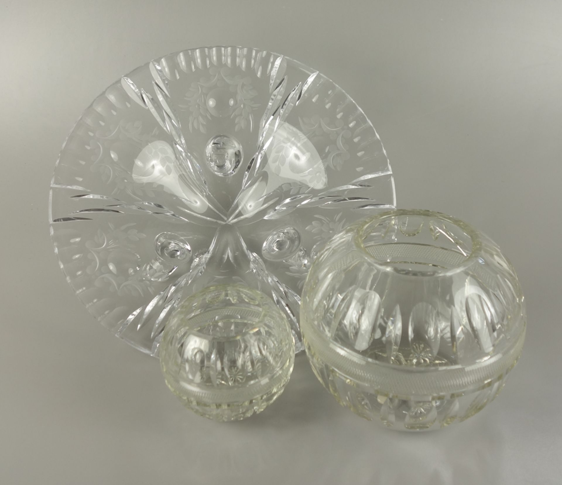 Bowl and pair of spherical vases, crystal, 2nd half 20th cent.