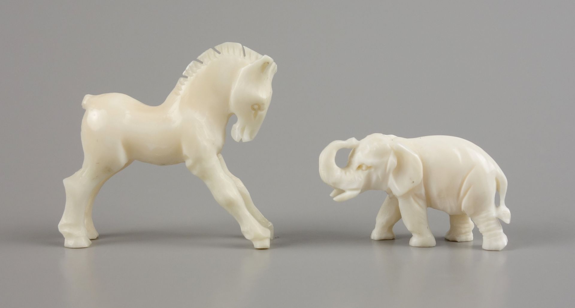 2 ivory miniatures: elephant and horse
