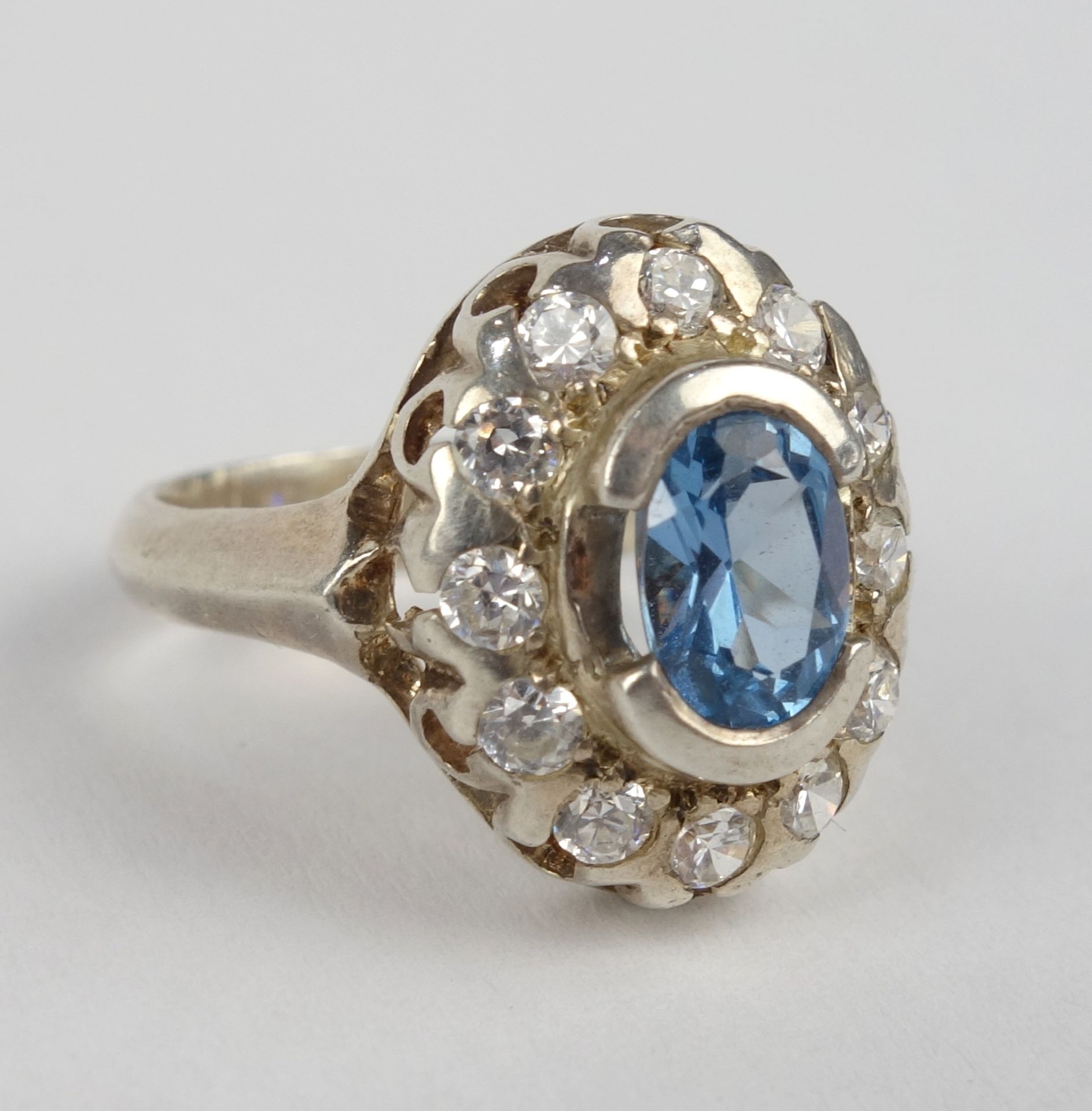 Ring mit hellblauem Stein und Zirkonias, 925er Silber, Gew.4,90g - Bild 2 aus 2