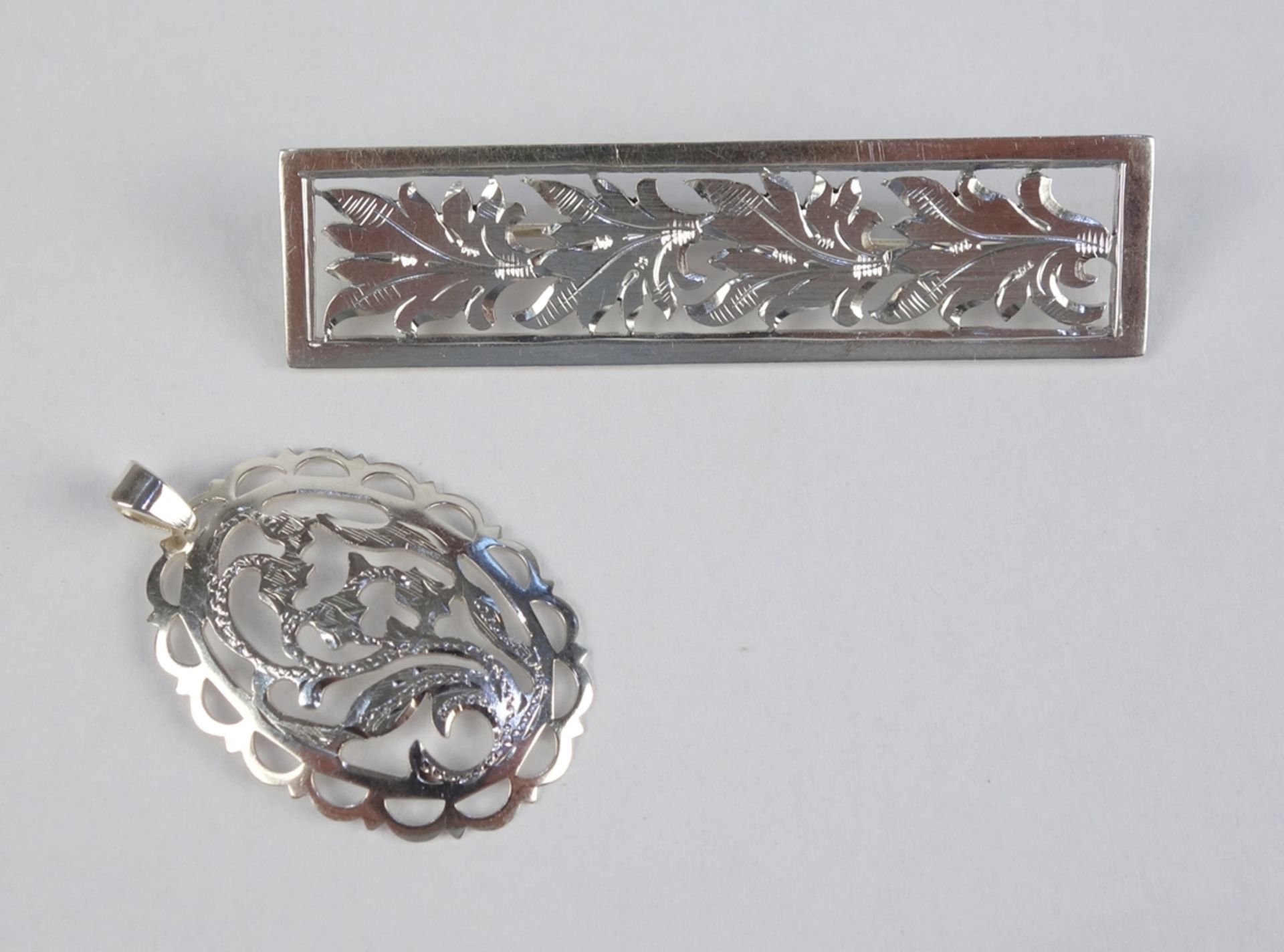 Brooch and pendant, floral work, silver