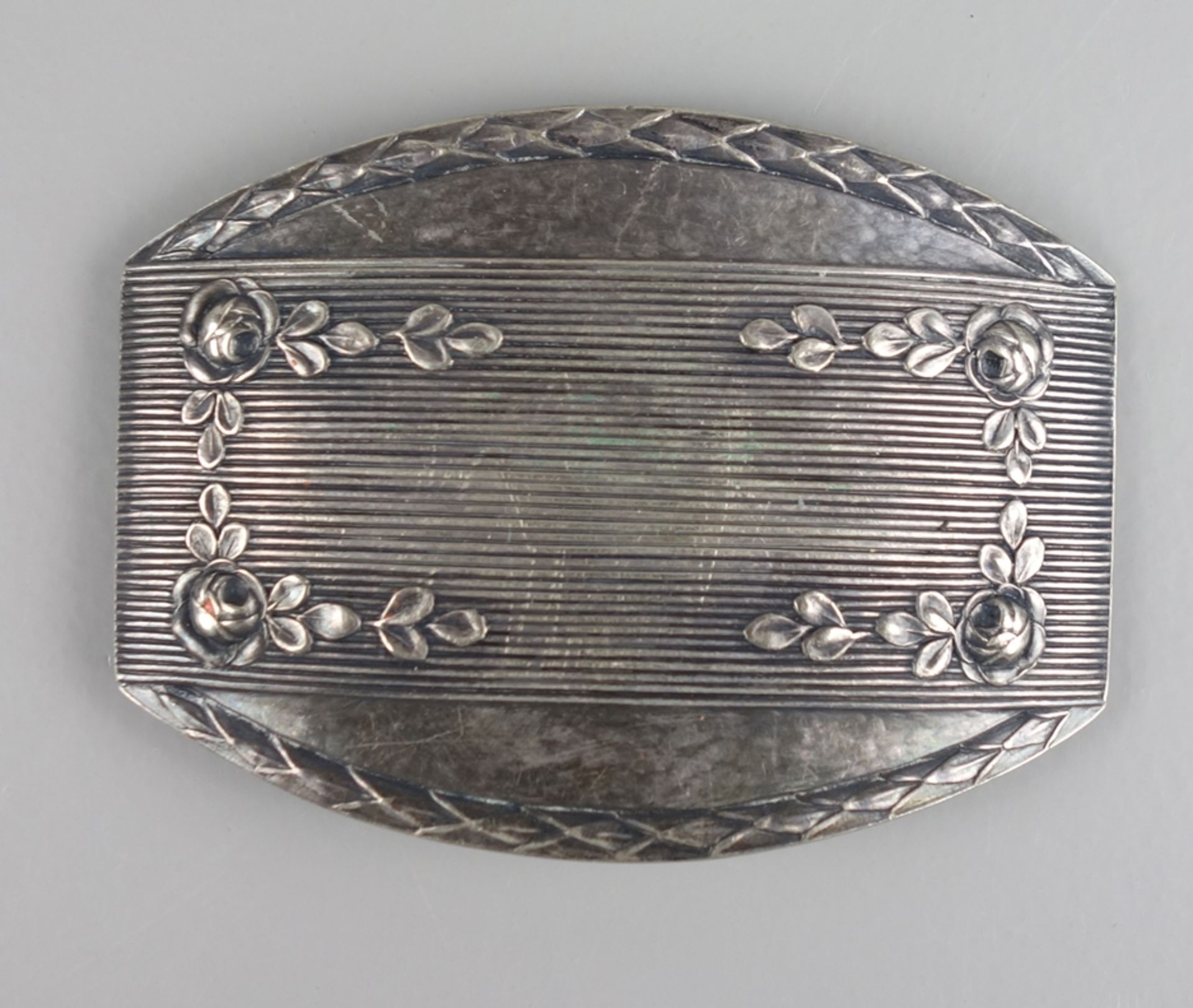 Belt buckle with floral relief, 1920s, alpaca silver
