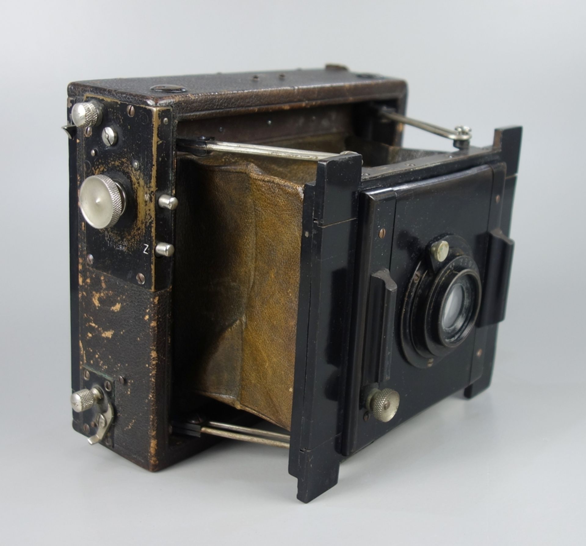 Leather metal folding camera, c. 1905