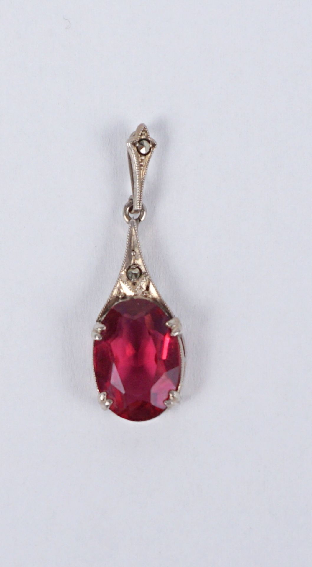 silver pendant with ruby coloured stone and marcasites, wt.2,22g