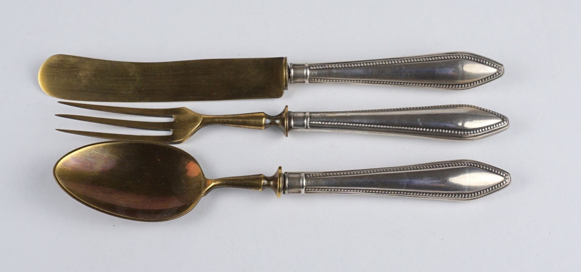3-piece cutlery set, silver/brass, early 20th c.