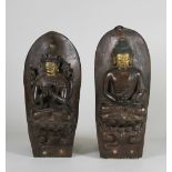 Paar Bronzerefliefs auf Holzsockel