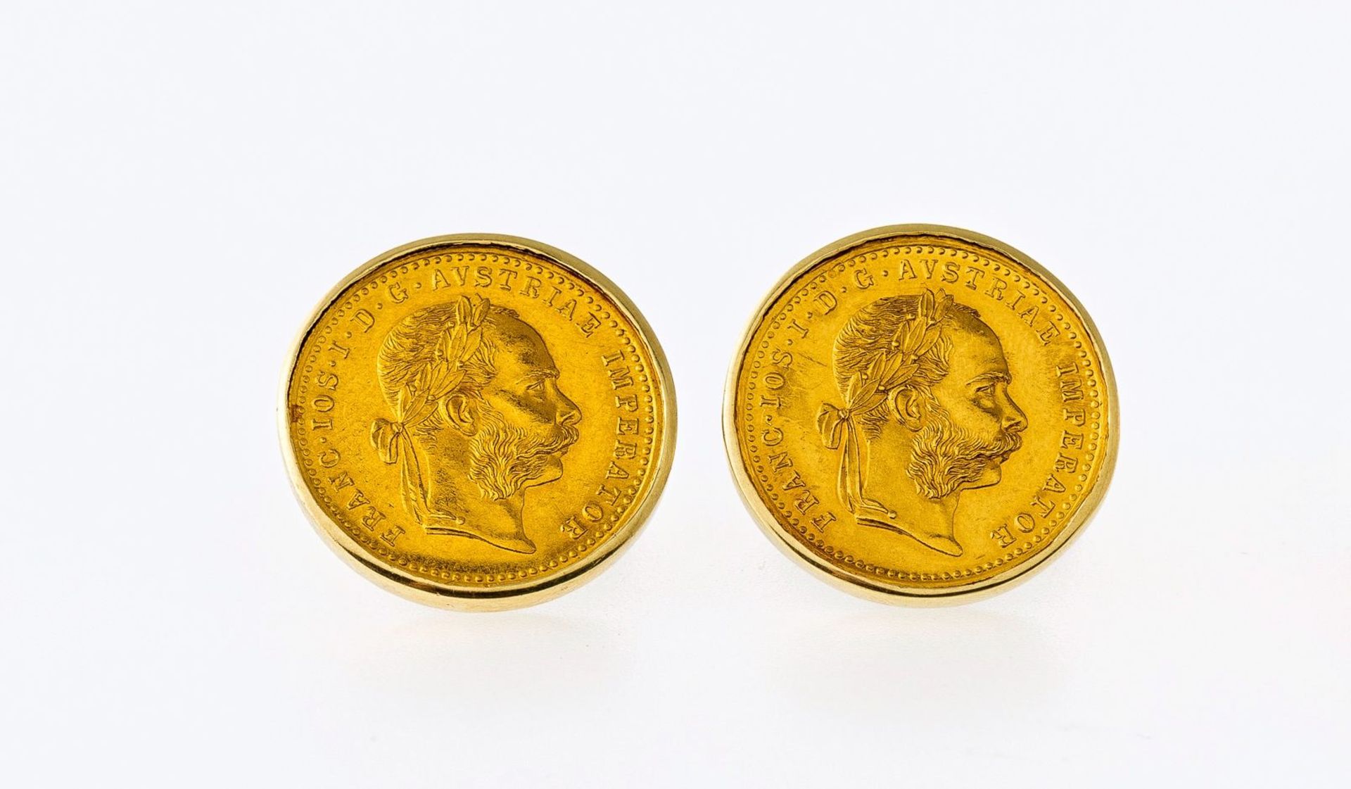 Paar Manschettenknöpfe mit Münzen