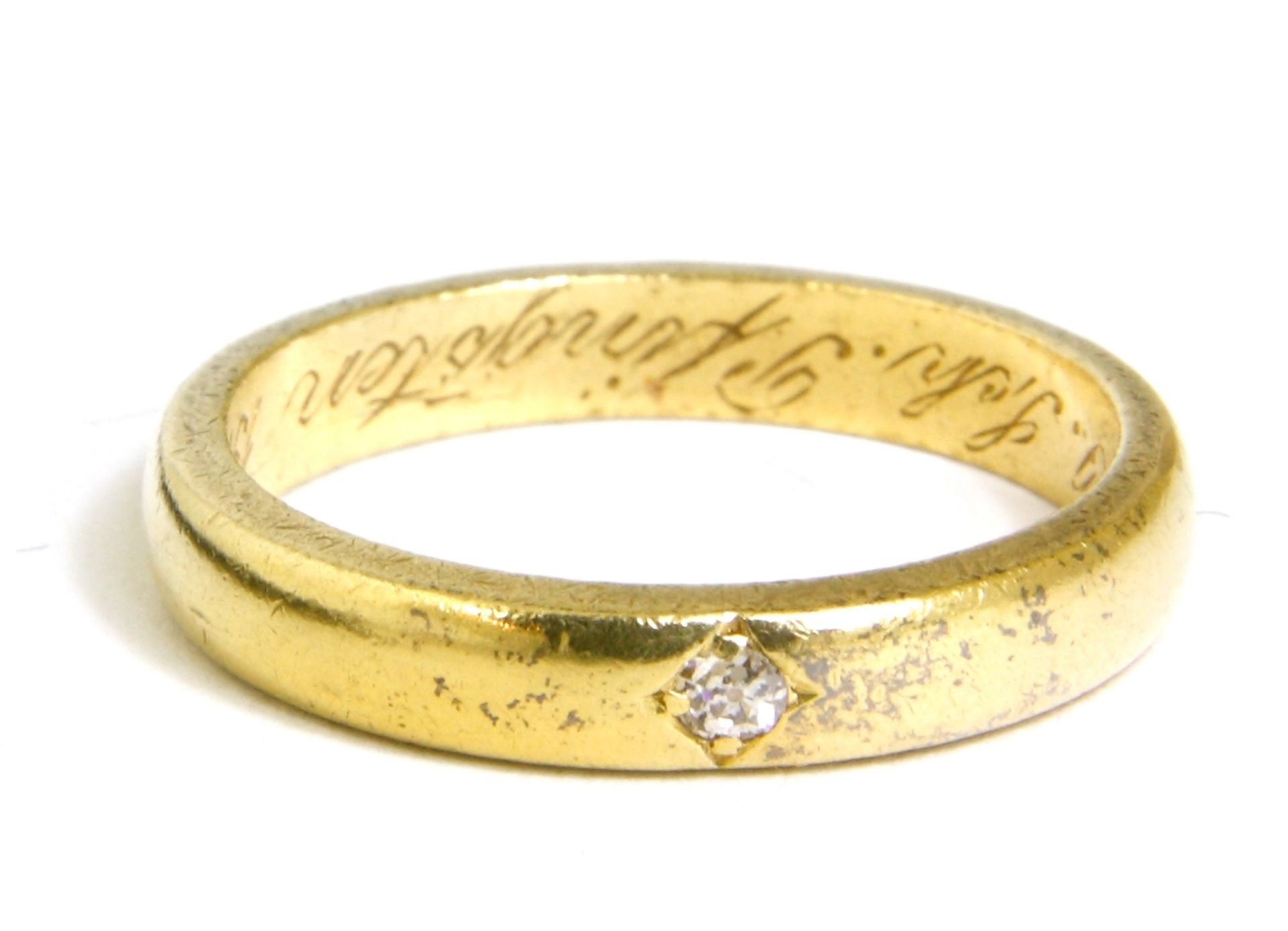 Ring, 750er GG. mit kleinem Diamanten