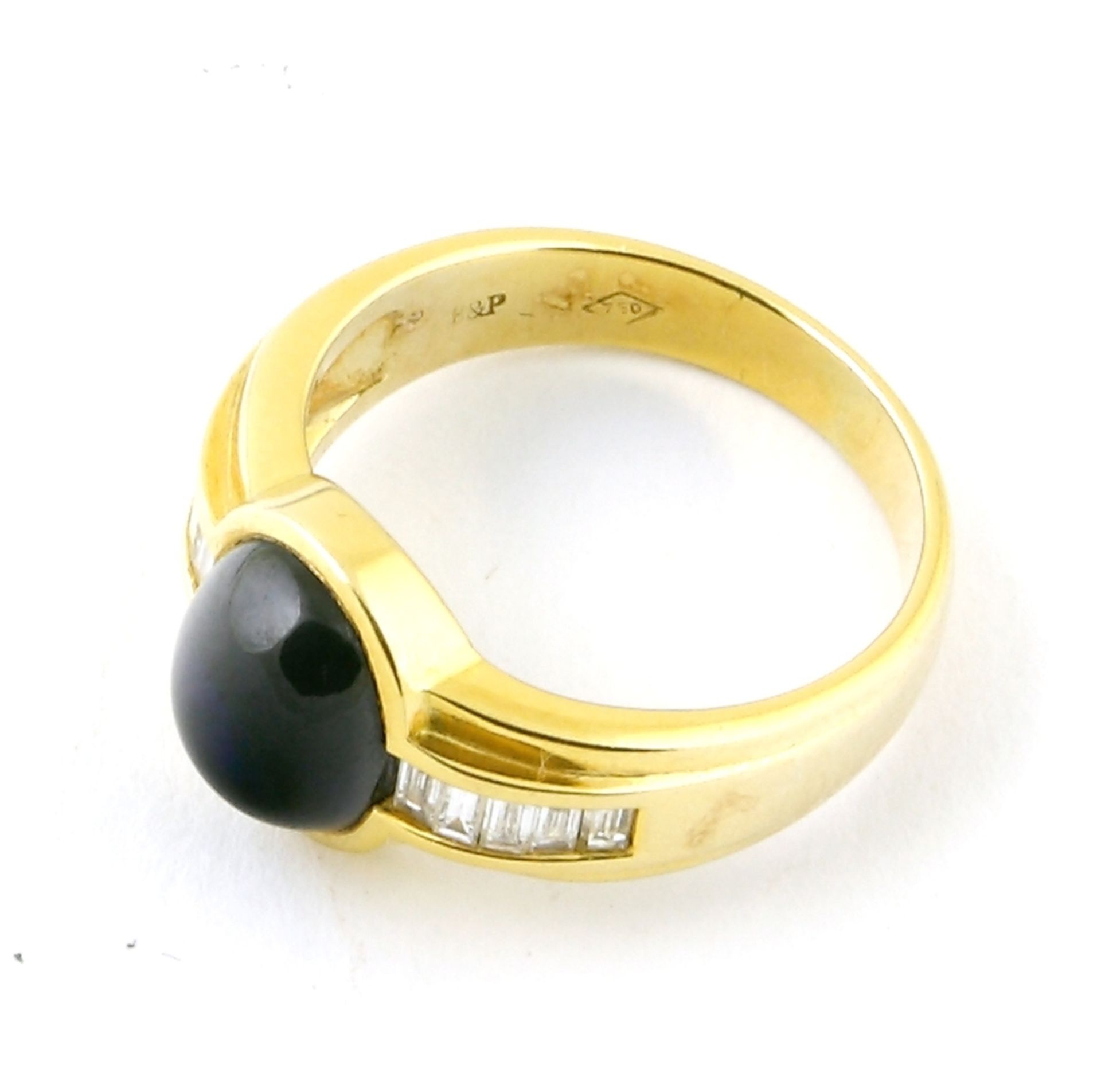 Ring, 750er GG. mit Saphir - Cabochon