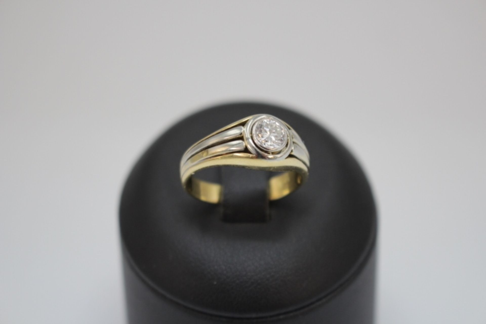 750/18kt.Bandring Vintage Bicolor mit Brillant ca,0,65ct besetzt RW:59 Gewicht:7,72gr.