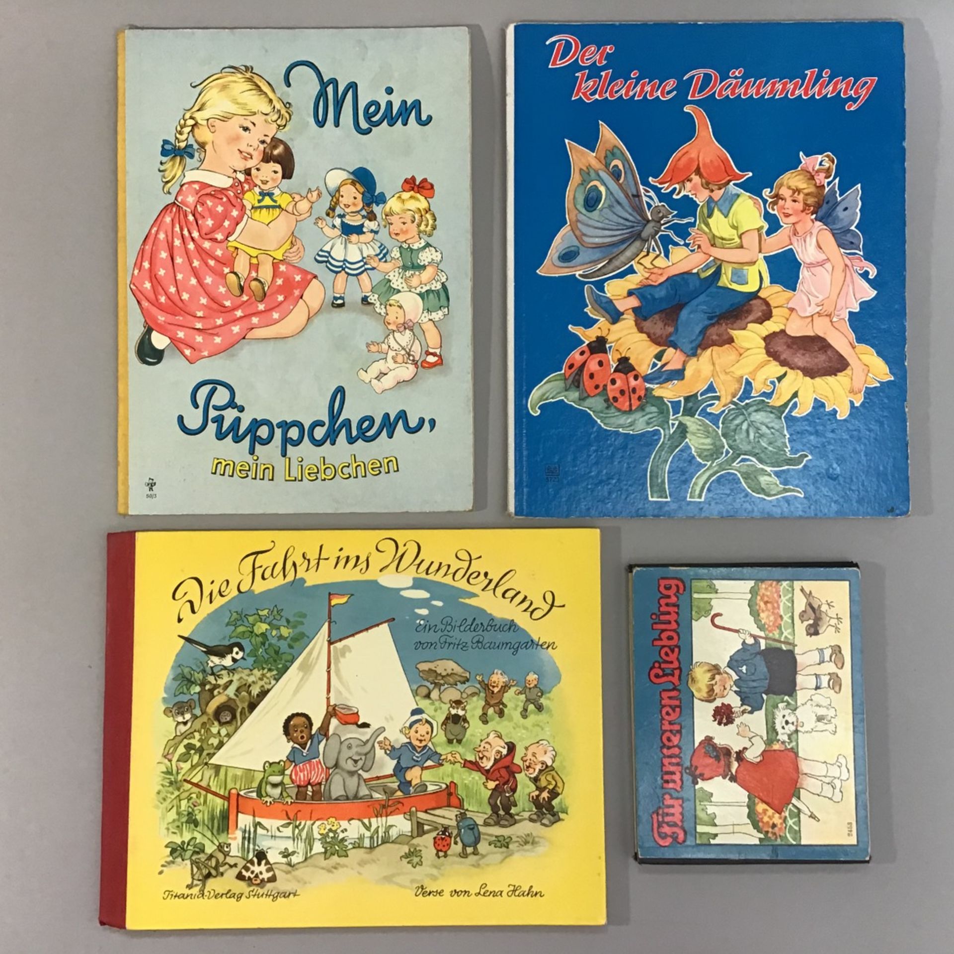 4 Kinderbücher: "Mein Püppchen" Felicitas Kuhn, "Die Fahrt ins Wunderland" F. Baumgarten, "Der