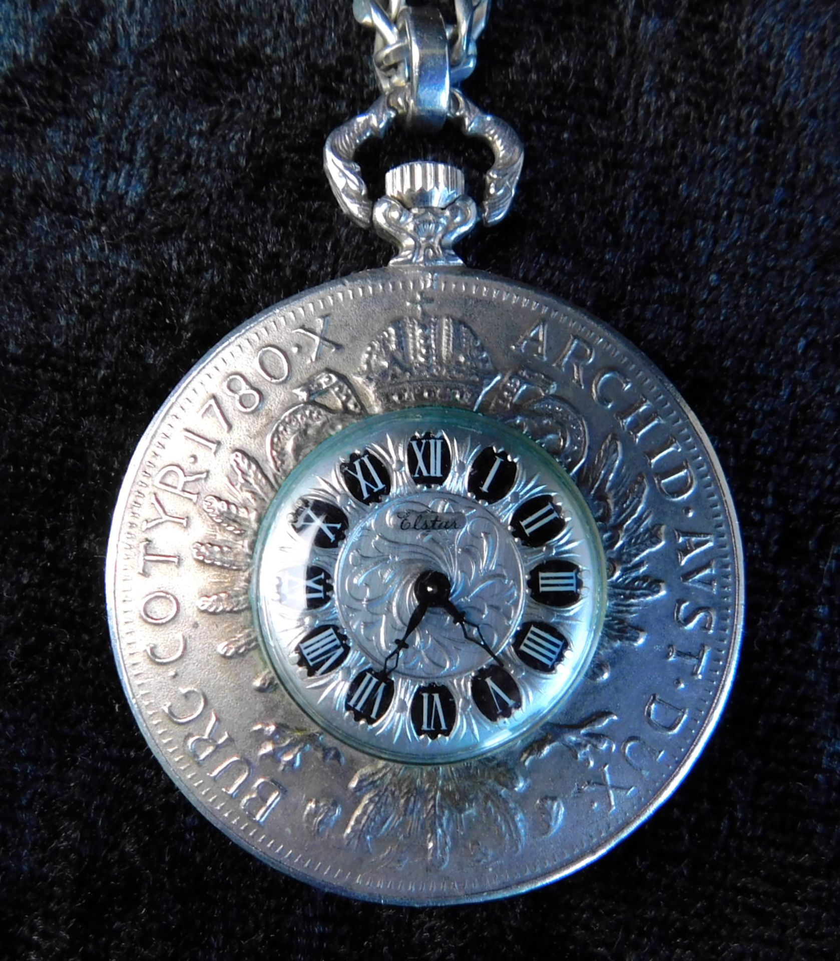 Taschenuhr ELSTAR, 835 Silber, eingearbeitet in einen Maria-Theresien-Taler Kette 925 S
