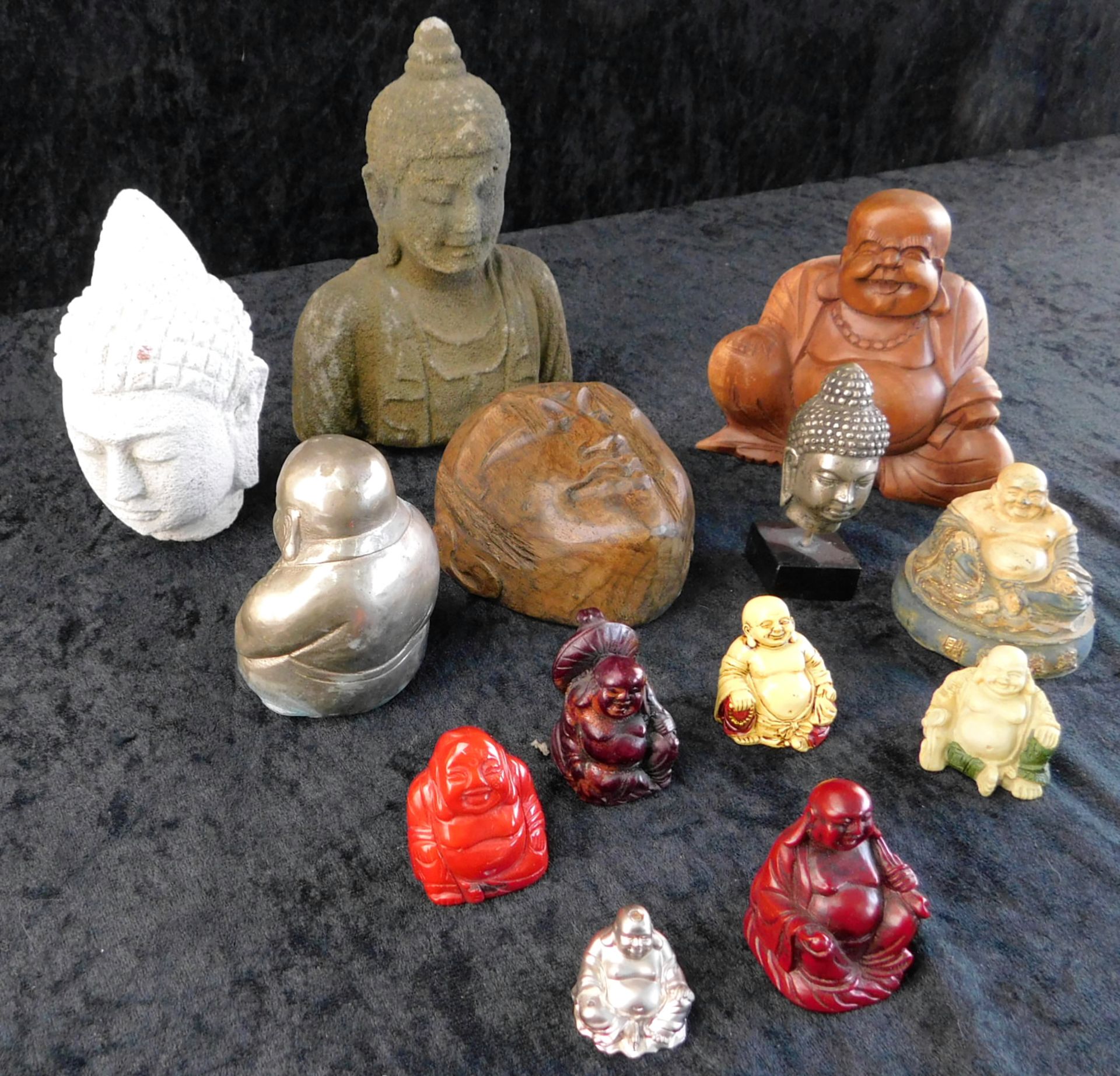 Konvolut aus 12 Buddha Figuren, 20.Jh., diverse Materialen, gut erhalten, Höhe 2 bis 16 cm