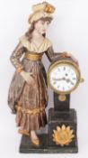 Uhrenweibchen, Mitte 19. Jh., Holz, farbig gefasst: Frauenfigur neben Uhr stehend, H. 37 cm. Uhr mit