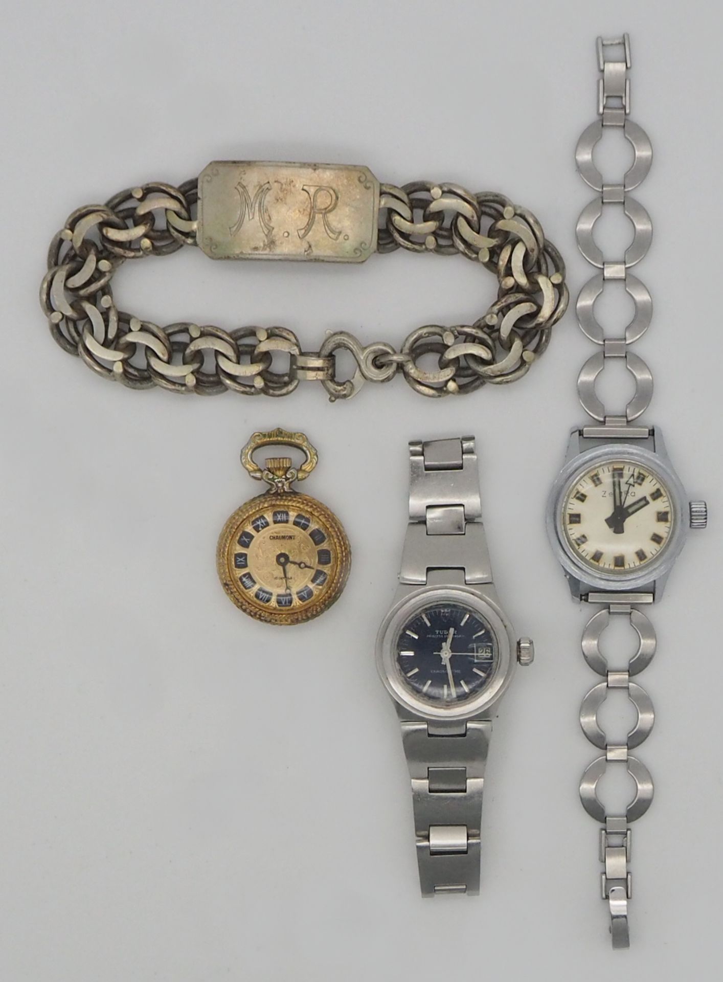 1 Konv. Armbanduhren u.a., TUDOR u.a. 1 Armband Silber monogr. "M,R,", je Tsp.