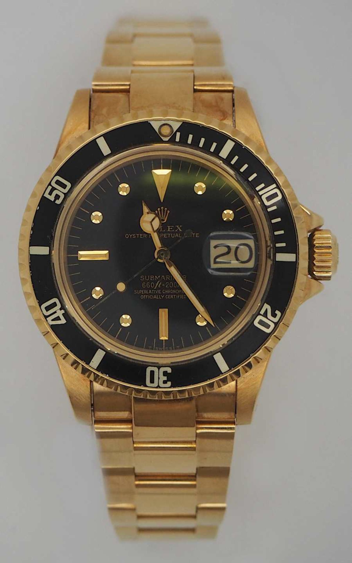 1 Herrenarmbanduhr ROLEX "Oyster Perpetual Date Submariner" GG 18ct. wohl 1970er/1980er Jahre</b