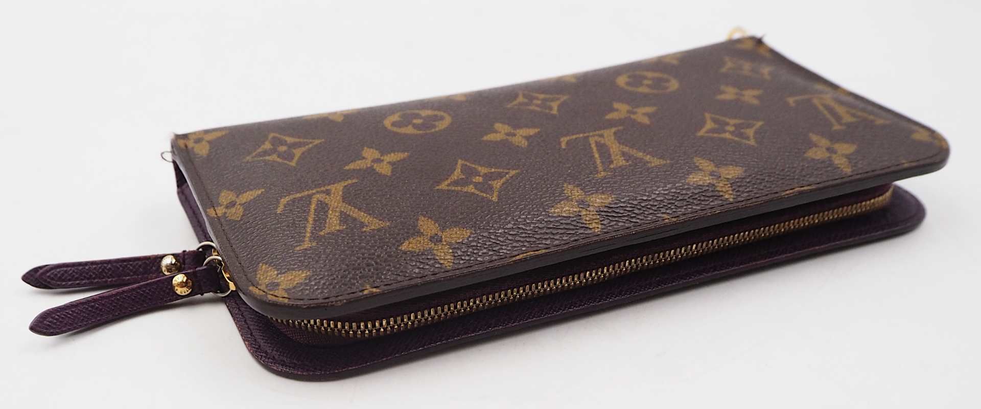 1 Geldbörse LOUIS VUITTON "Monogram" pflaumenfarbenes Innenfutter, sichtbare Gsp. sow - Bild 2 aus 3