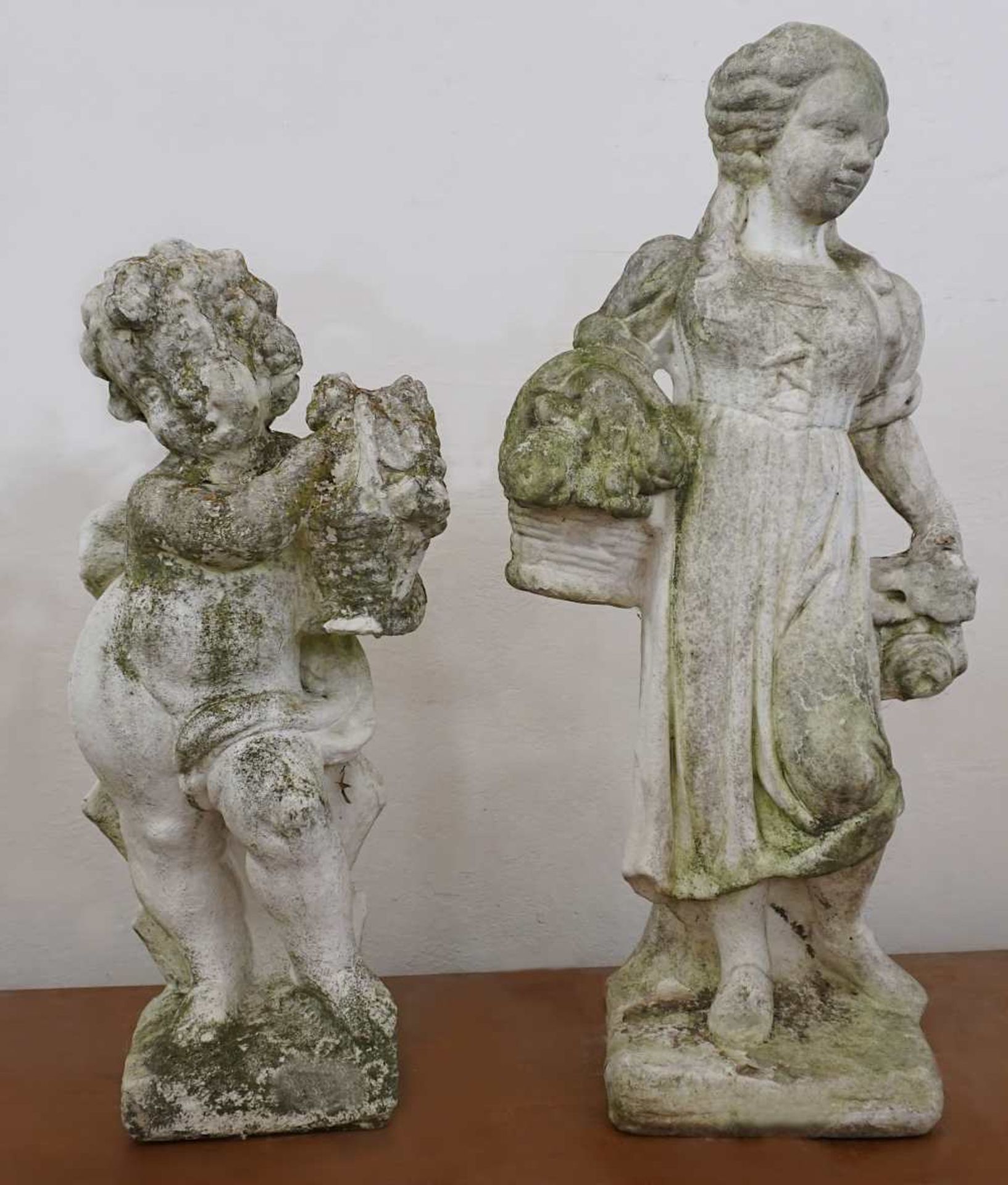 2 Gartenskulpturen wohl 20. Jh. Gips "Frau mit Blumenkorb" ca. H 74cm; "Putto mit Kör