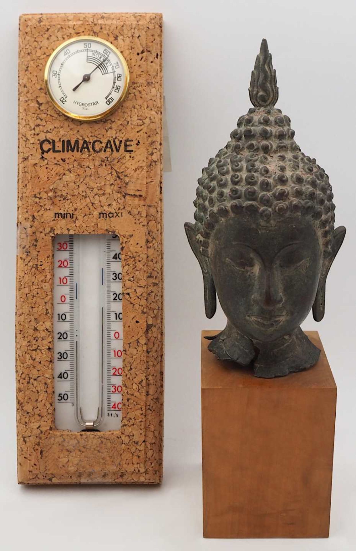 1 Büste "Buddha" 20. Jh. Metall auf Holzsockel Gesamthöhe ca. 29cm sowie 1 Thermomet