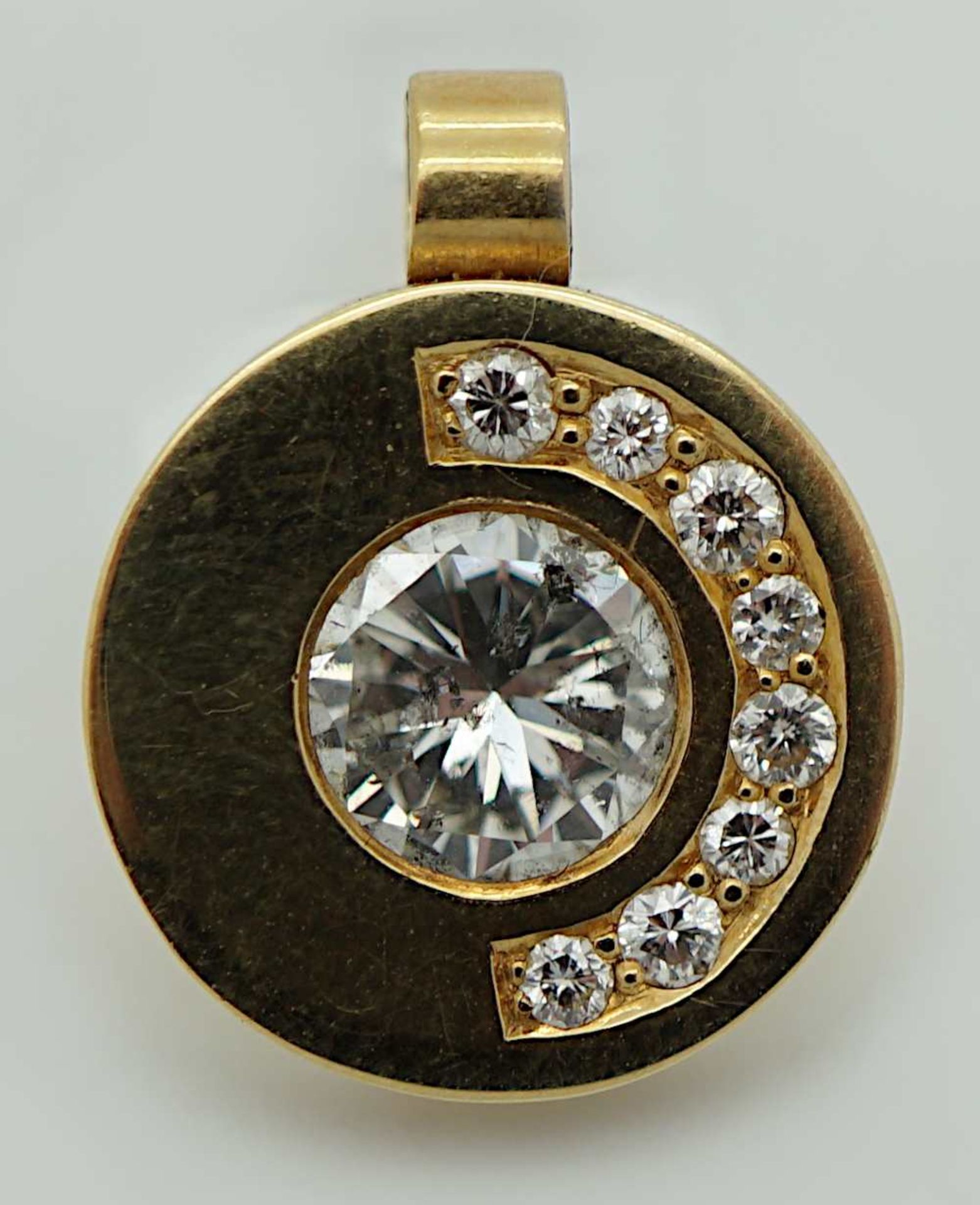 1 Anhänger GG 18ct. Brill. ca. 0,6ct. Piqué sowie kl. Brill.