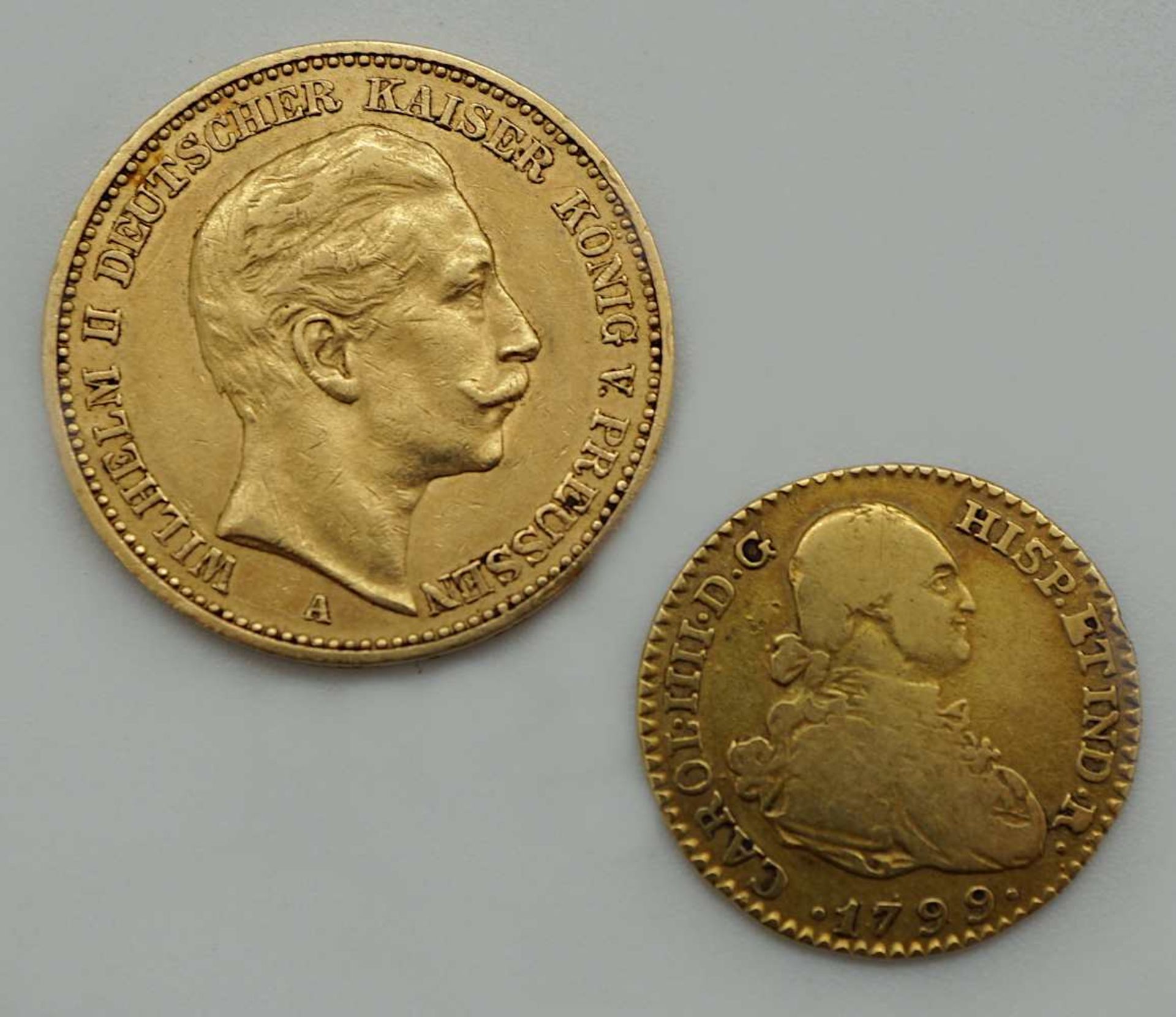 2 Goldmünzen "Wilhelm II. Deutscher Kaiser" 20 Mark 1902 und "Carol IIII D G" 1799 Gsp. <br