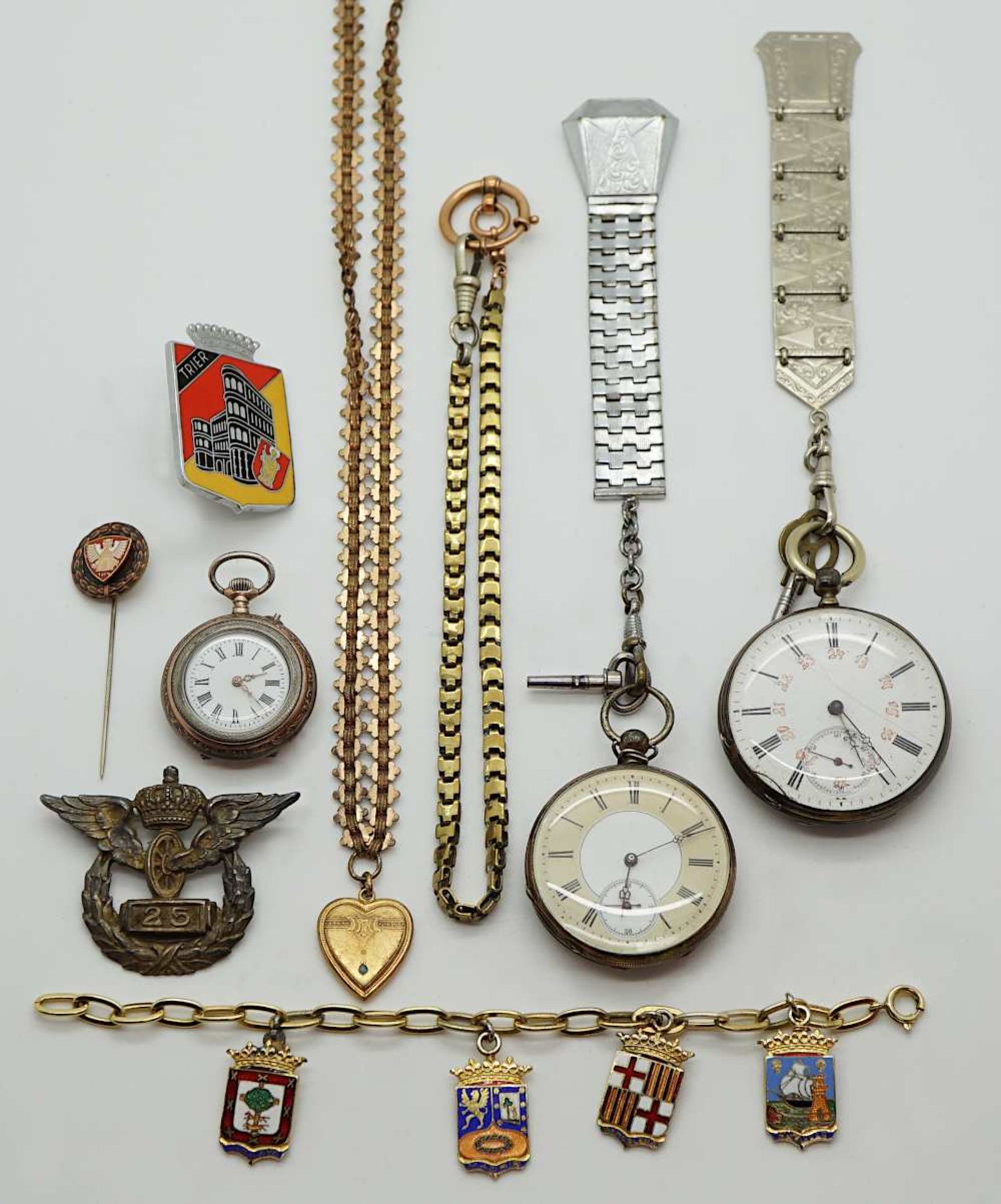 1 Konv. Taschenuhren z.T. wohl Si. um 1900 Uhrkette, Anstecker nztl. sowie 1 Brosche Si. 800 alt