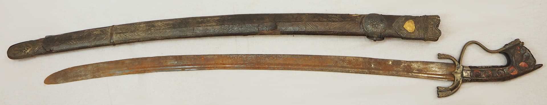 1 orientanlischer Säbel wohl 19. Jh. Klinge mit Doppelkehlung, Holzgriff mit Metallap