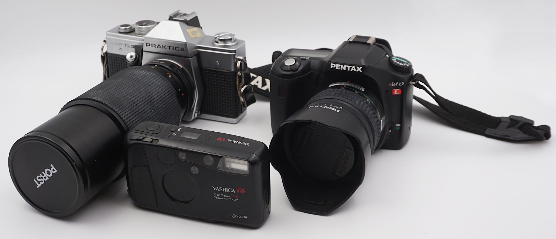 1 Konv. Fotoapparate PRAKTICA "Super TL3", NIKON "F60", PENTAX "istD", MINOLTA "Dynax 3xi"