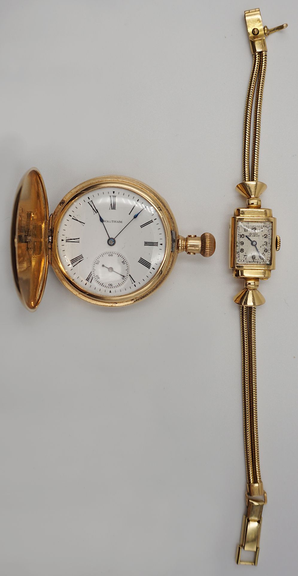 1 Taschenuhr AMERICAN WALTHAM WATCH GG 14ct. mit Stern verziert mit Diamantrosen/Rubin