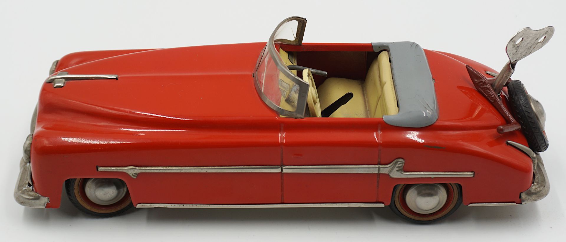 1 Aufziehauto DISTLER "Packard Cabrio" wohl 1950er Jahre, rot