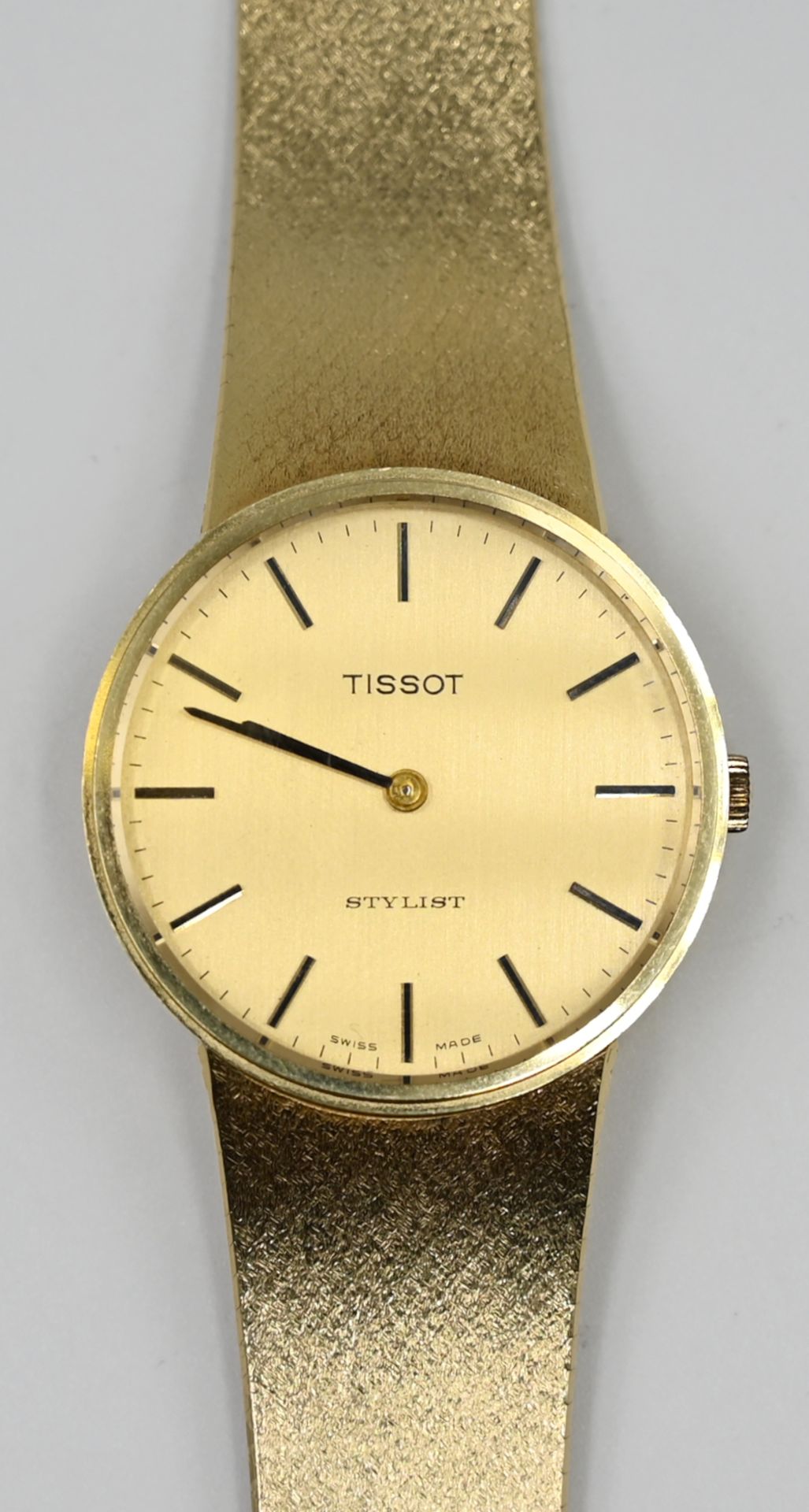 1 Herrenarmbanduhr GG 18ct. TISSOT "Stylist"