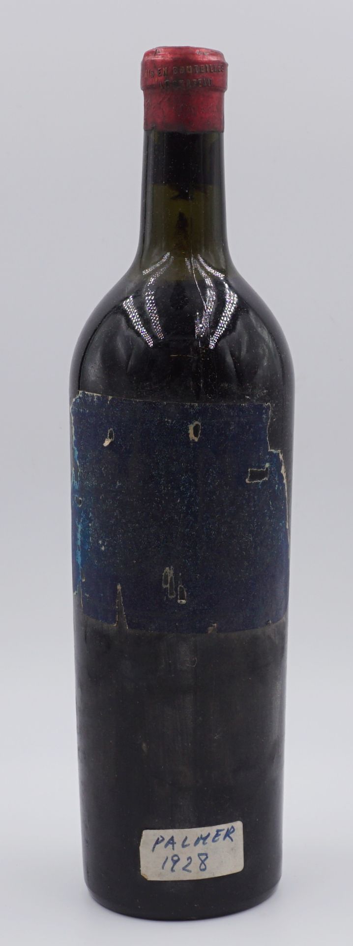 1 Flasche Rotwein auf Verschluss bez. "Chateau-Palmer Margaux" wohl 1928, Etikett stark besch., Asp.