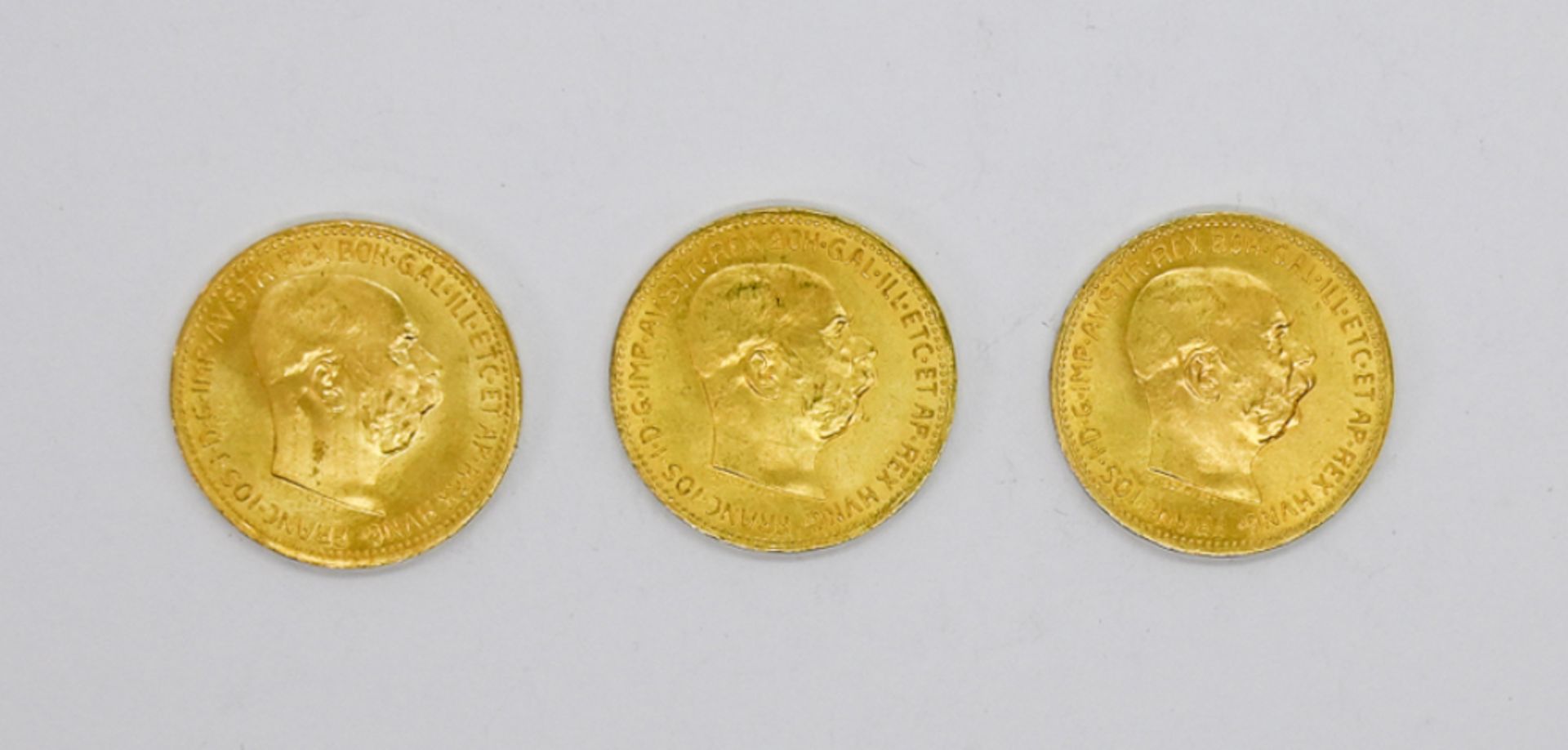 Drei Goldmünzen, Österreich, à 20 Kronen