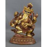 Ganesha mit vier Armen, in den Händen je eine Axt, ein Seil, eine "Süßigkeit" und eine Lotusblume,