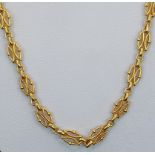 Kette, aufwendig gearbeitet mit Halbbögen und kleinen Kugeln, 750/18K Gelbgold (getestet), 24,5g,