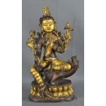 Guanyin - Kwan-Yin auf Drache sitzend, Vergoldung, Bronze (gewichtet), Asien, 28x14x10cmGuanyin -