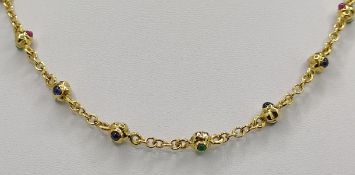 Kette mit Kugelelementen und Schmucksteinen, 750/18K Gelbgold, Italien, 24g, Länge 42cmNecklace with