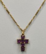 Kreuz mit Amethysten 585/14K, 1,2g, Länge 1,2cm an Kette 750/18K Gelbgold, 3,7g, Länge 40cm