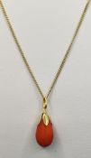 Drop-shaped pendant in dark orange, probably coral, on fine curb chain, 585/14K yellow gold, 2.6g (