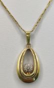 Drop shaped pendant with 7 small diamonds on chain, together approx. 1 ct, pendant and chain 585/14